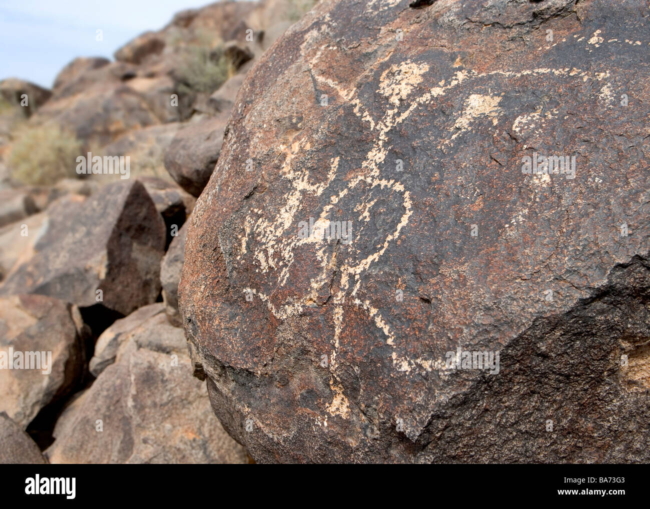 An ancient Hohokum Indian Petroglyph of a pregnant mother and newborn baby This art is located at Picacho Peak Arizona. Stock Photo