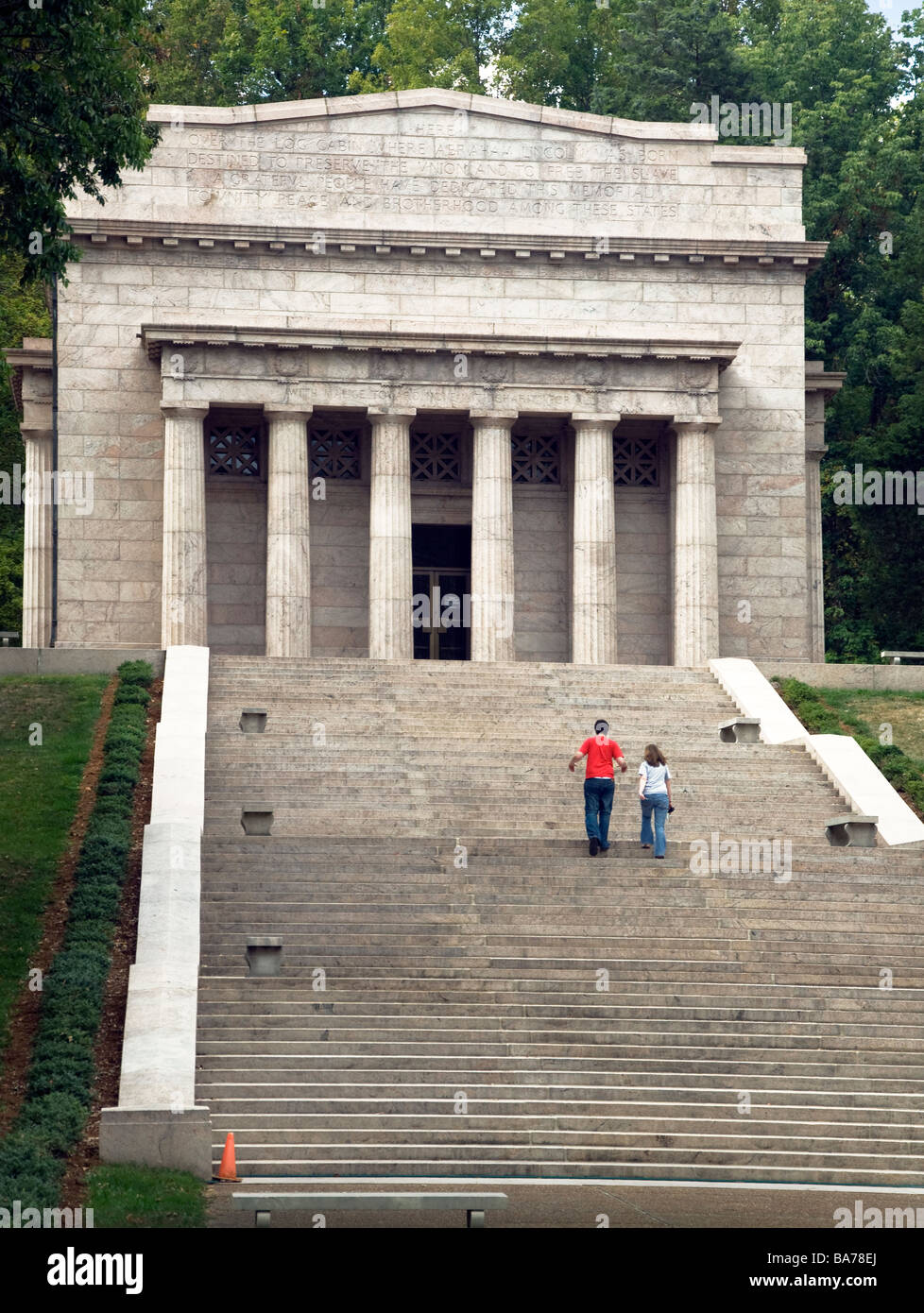 A family walks  in front of the Memorial Building at Abraham Lincoln Birthplace National Historic Site near Hodgenville Kentucky Stock Photo