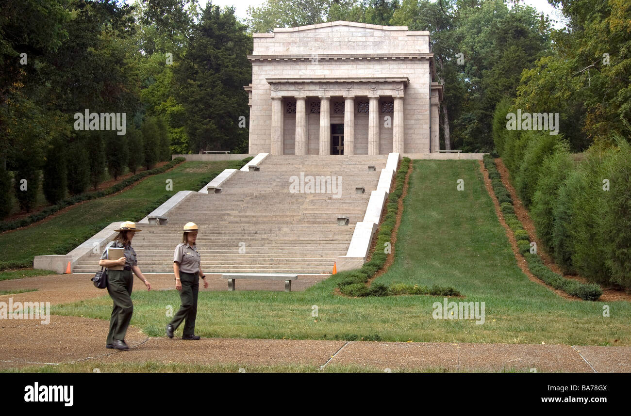 Park rangers walk in front of the Memorial Building at Abraham Lincoln Birthplace National Historic Site near Hodgenville KY Stock Photo