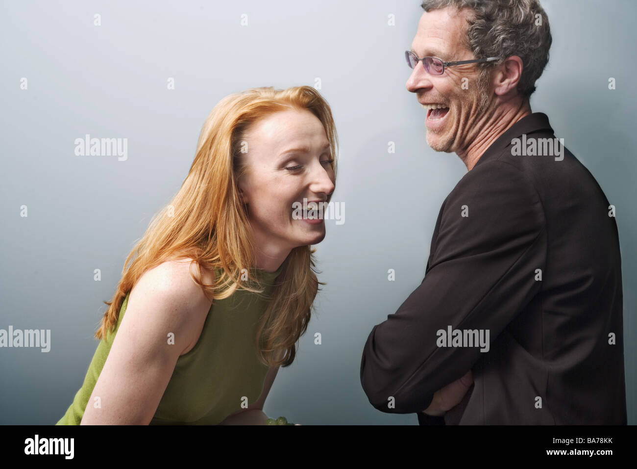 Mate cheerfully laughs semi-portrait broached series people two 20-30 years 40-50 years ages old-age-difference adults Stock Photo
