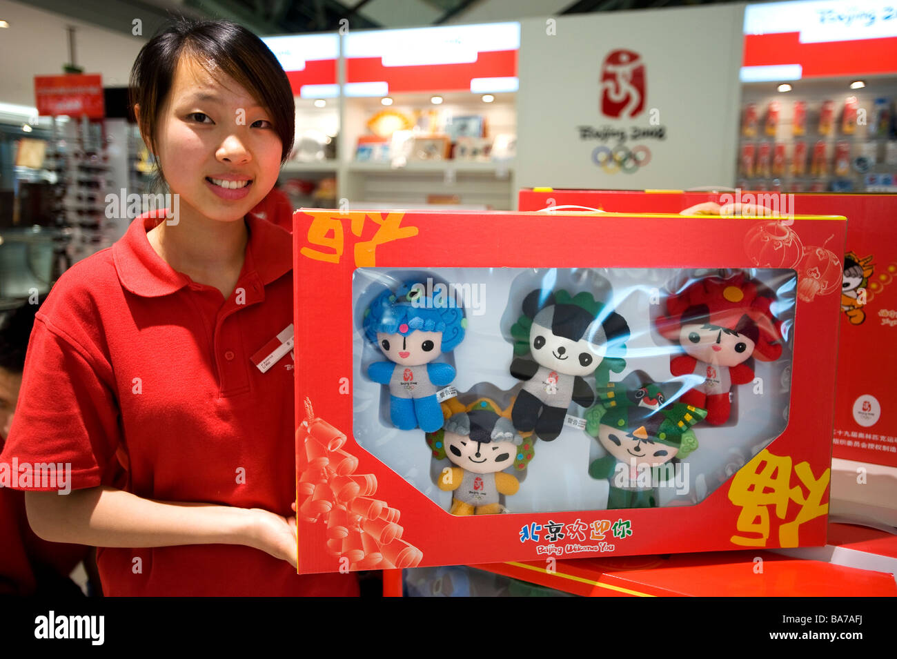 China, Beijing, 2008 Olympics mascots in a shopping mall on wangfujing street the green is Nini the swallow representing Stock Photo