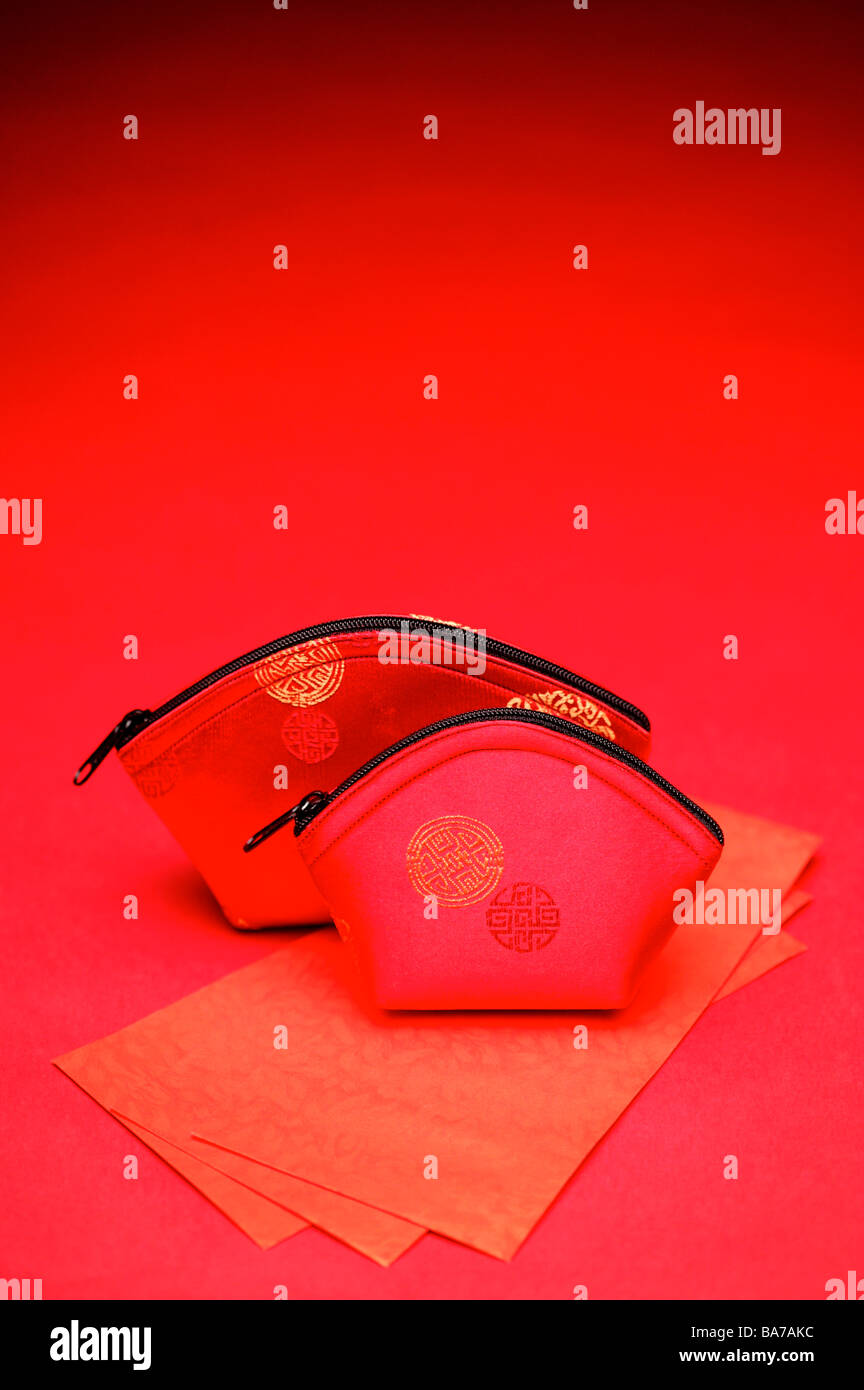 Chinese silk bags and red envelopes Stock Photo