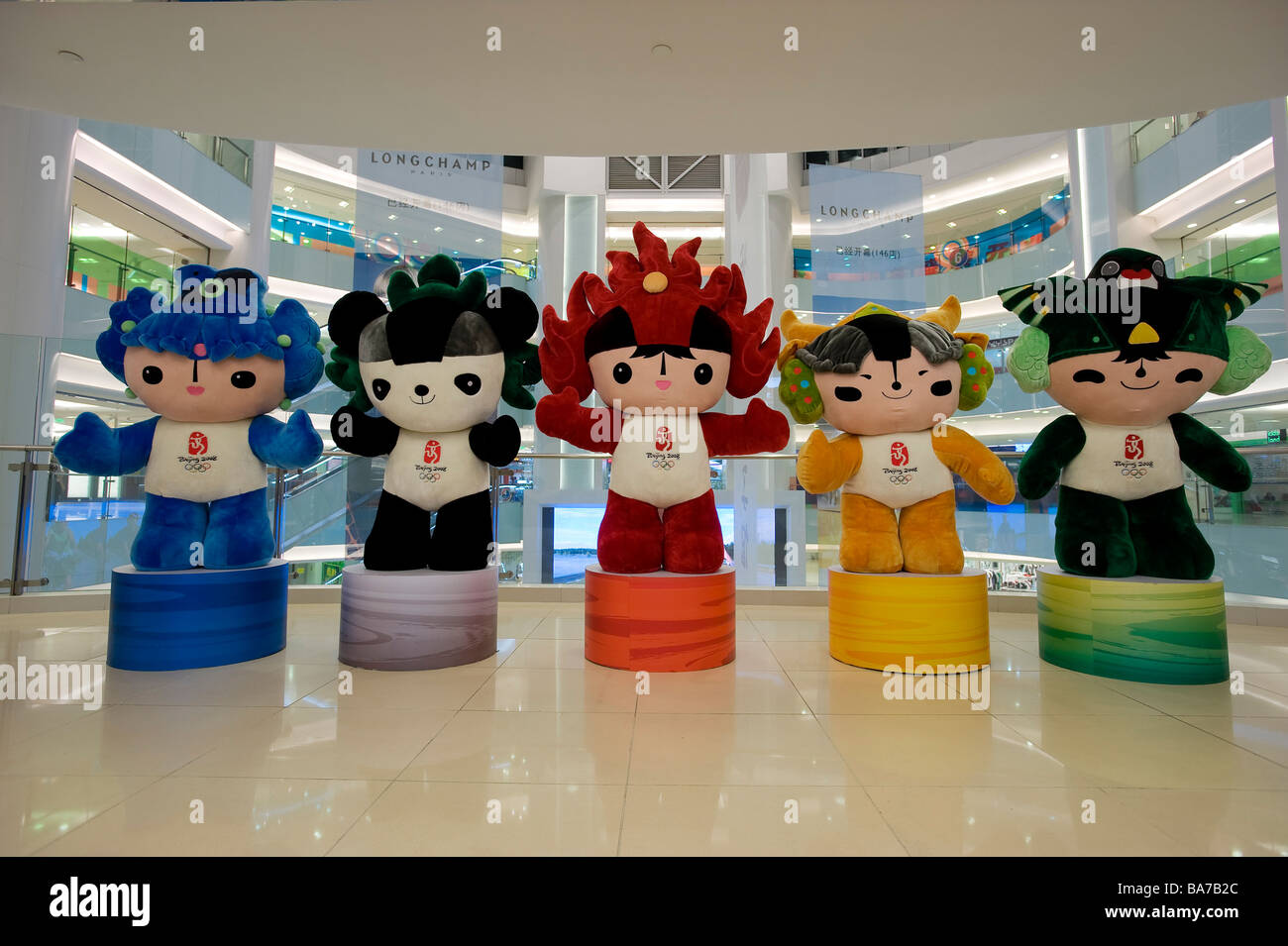 China, Beijing, 2008 Olympics mascots in a shopping mall on Wangfujing street,the green is Nini the swallow representing Stock Photo