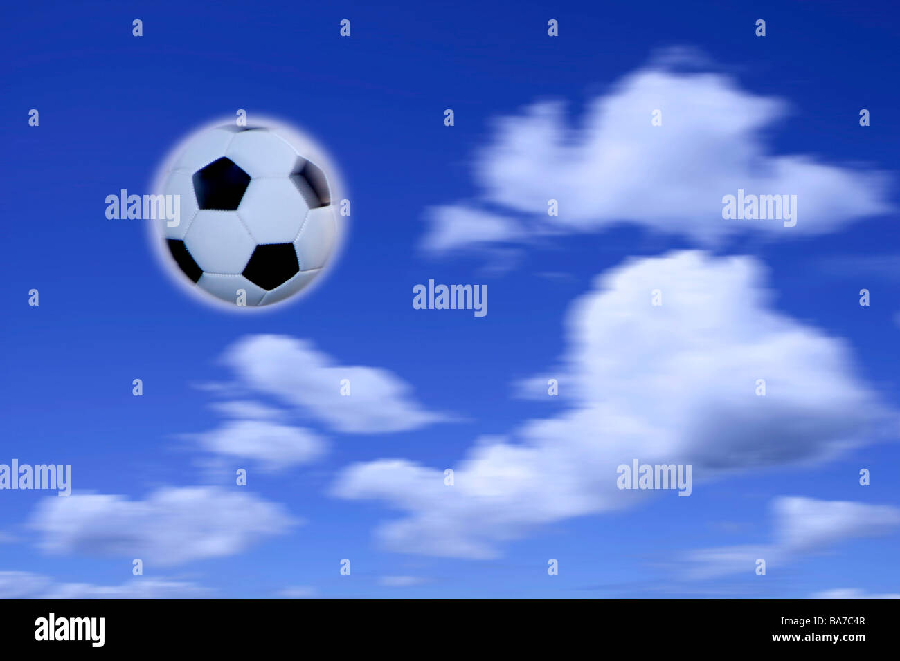 Soccer ball in mid air Stock Photo Alamy