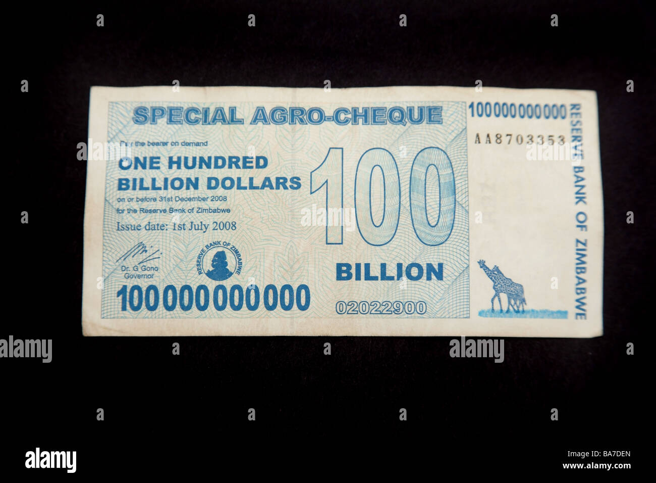 Zimbabwean 100 billion dollar note on a black studio background Stock Photo