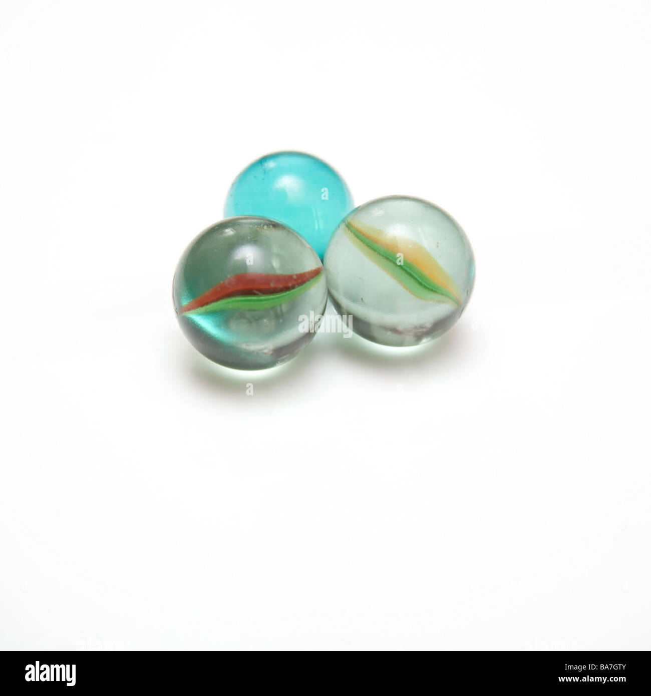 Glass marbles isolated on a white studio background Stock Photo