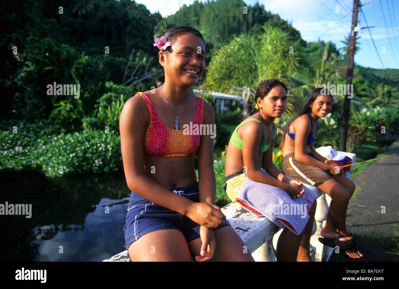 tahiti girls Three local girls along the coast road, Tahiti, French Polynesia, south sea  Stock Photo - Alamy