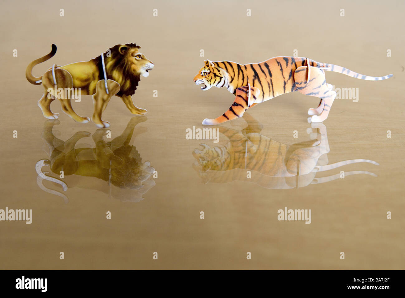 Toy Steckfiguren tigers lion opposite table toy animals toy-animals  game-figures colorfully 3-D puzzles together-been Stock Photo - Alamy