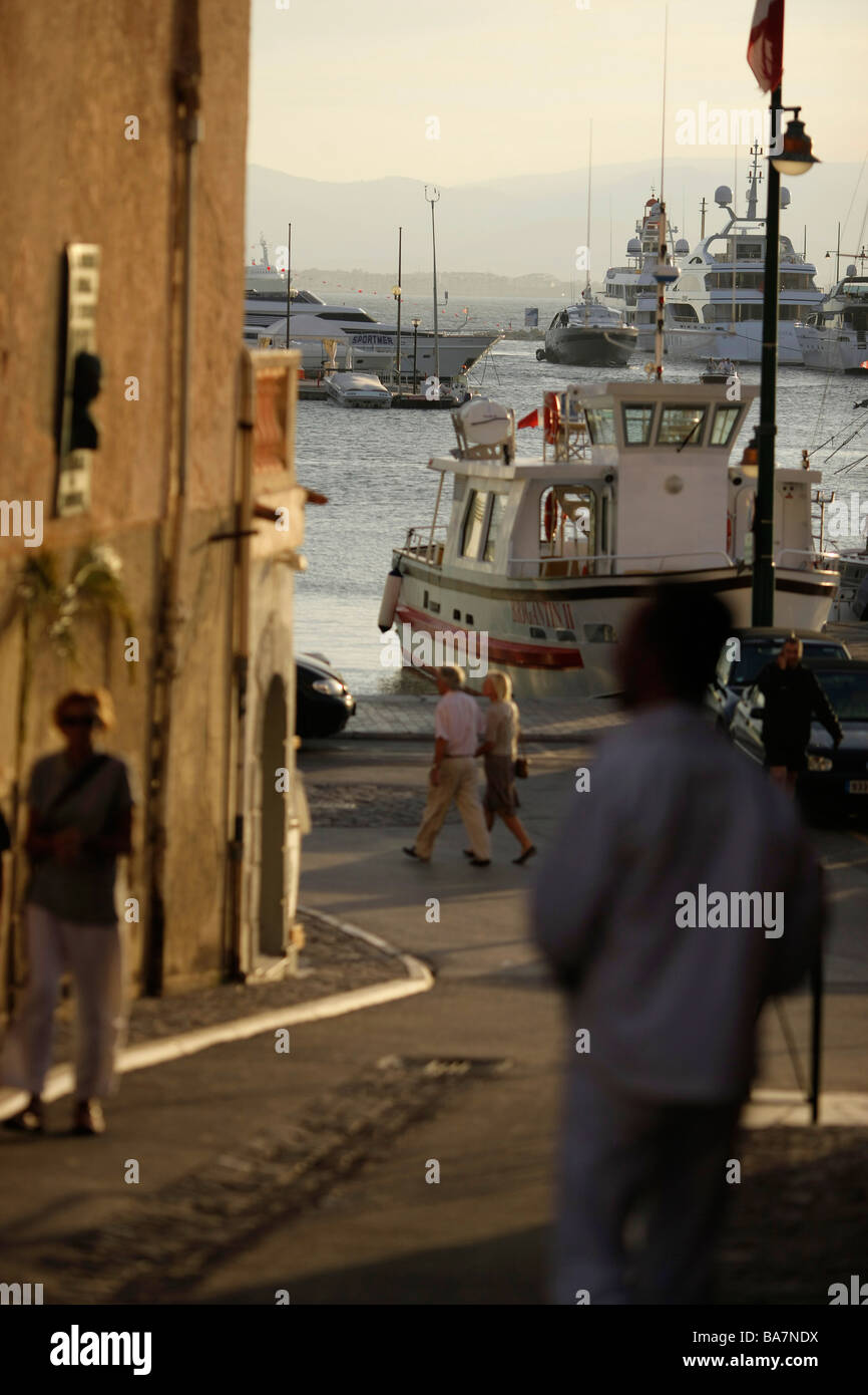 View towards the yacht harbour from a side street, Promenade, St.Tropez, Cote d´Azur, Provence, France Stock Photo
