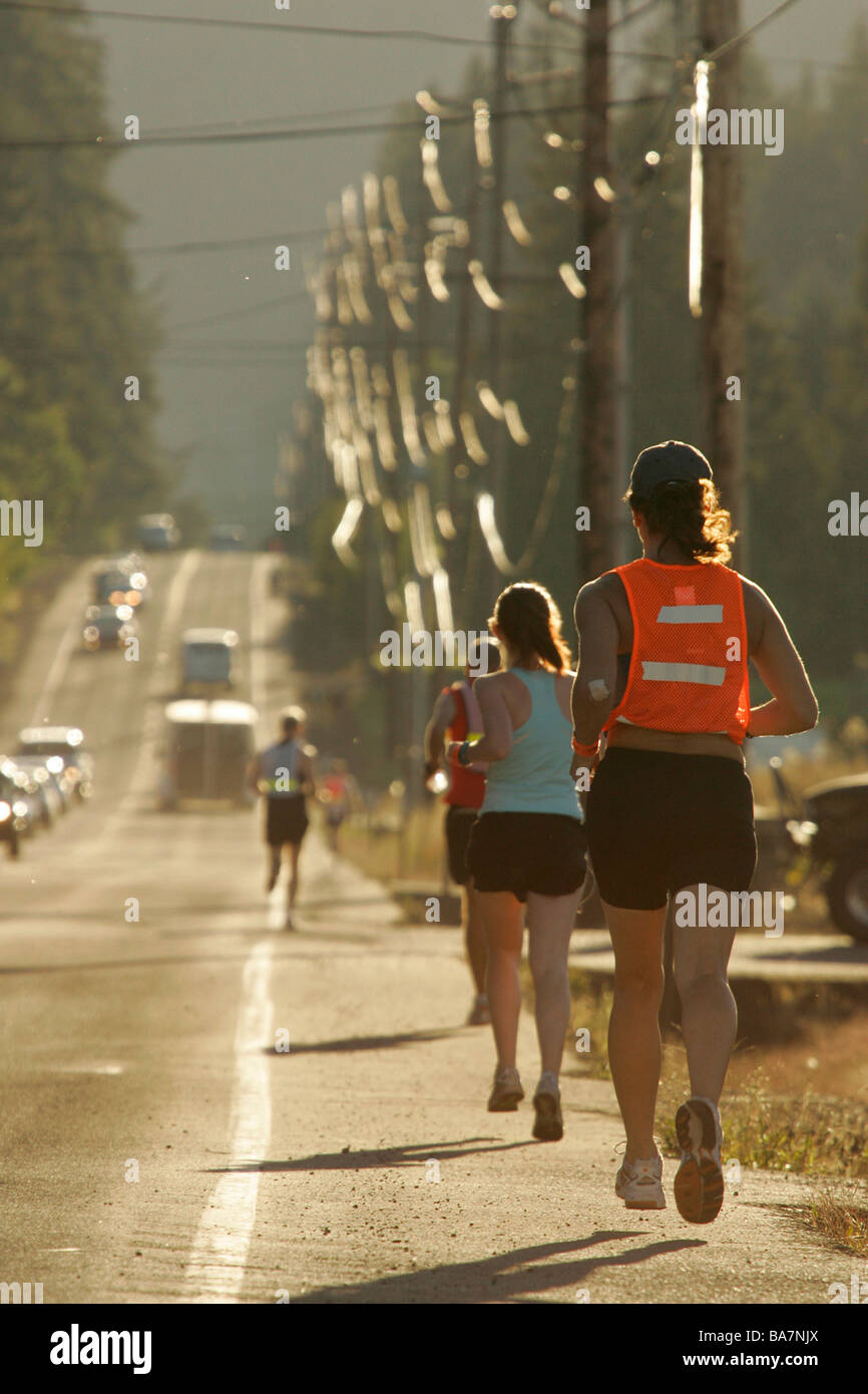 Runner near Sandy, relay race from Mount Hood to the coast, Oregon, USA Stock Photo