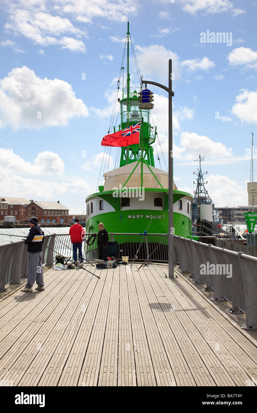 Boys Fishing from Gosport Pier in Front of the Mary Mouse 2 lightship