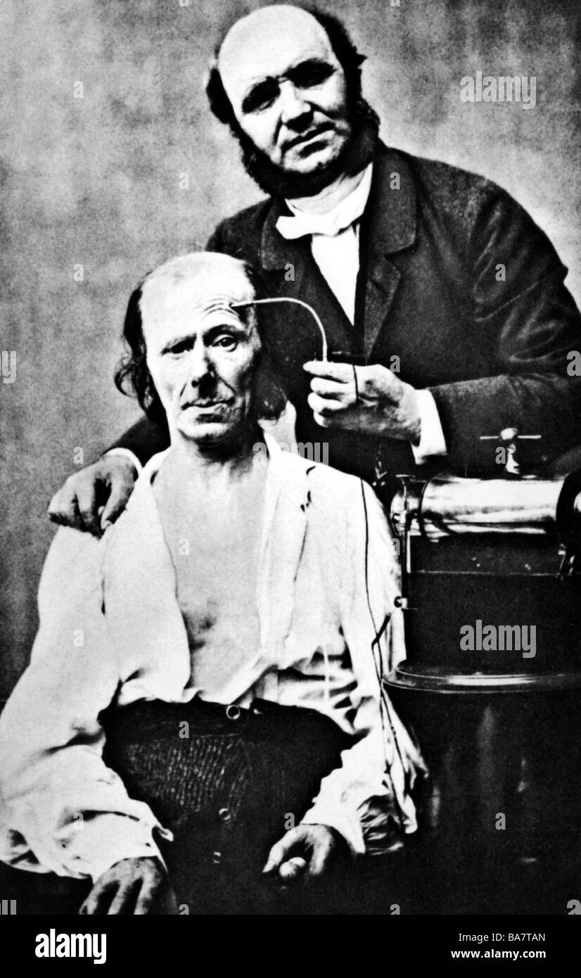 Duchenne, Guillaume (referred to as G. de Boulogne), 17.9.1806 - 15.9.1875, French neurologist, inventor of electro-therapeutics, with a patient, 1862, half length, Stock Photo