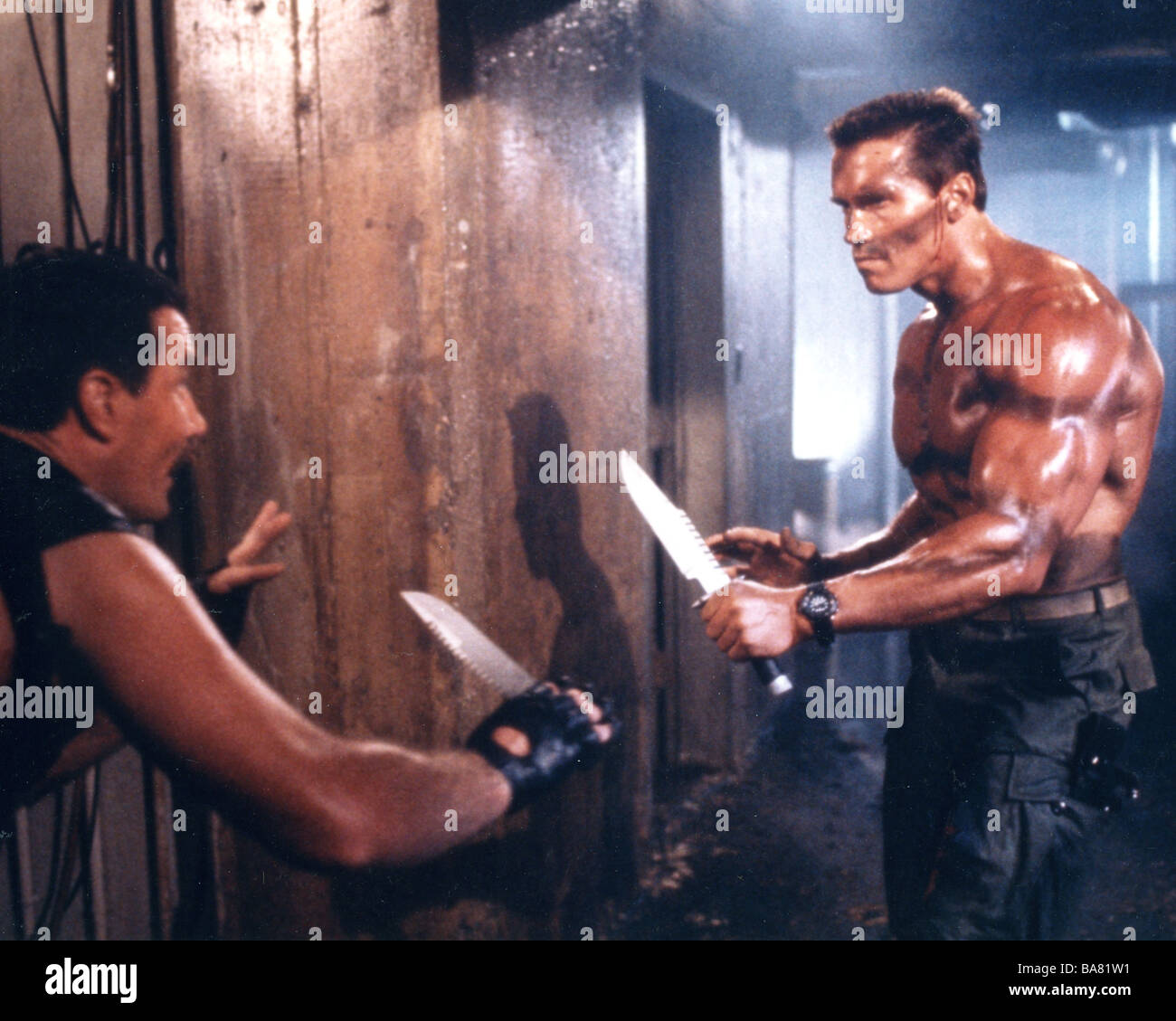 COMMANDO  1985 TCF film with Arnold Schwarzenegger at right Stock Photo