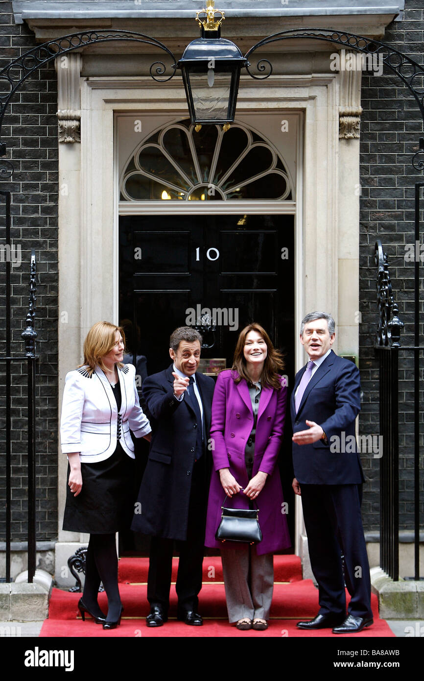 French President Nicolas Sarkozy and wife Carla Bruni Sarkozy with Prime Minister Gordon Brown and wife Sarah at Downing Street Stock Photo