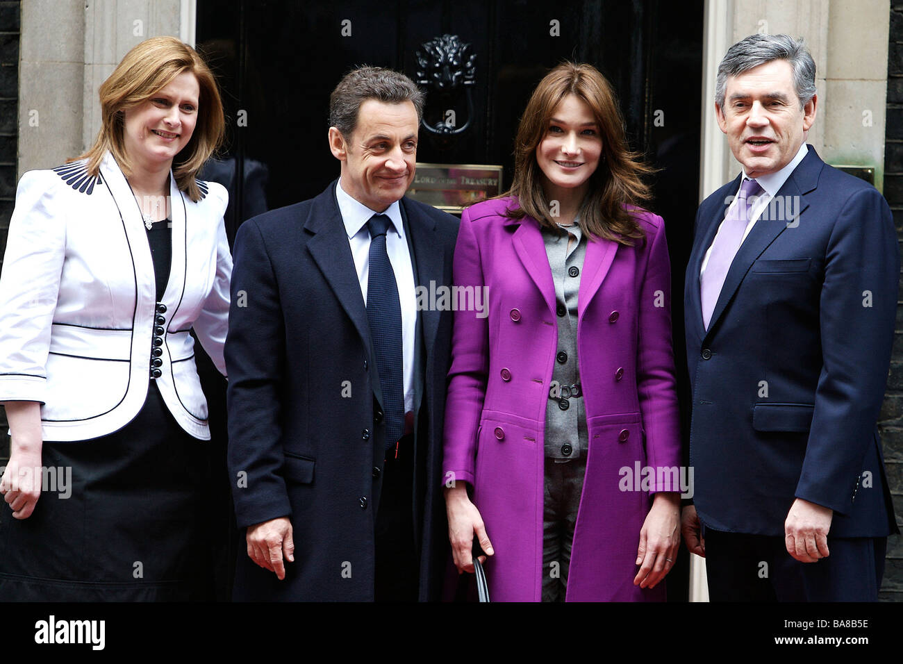 French President Nicolas Sarkozy and wife Carla Bruni Sarkozy with Prime Minister Gordon Brown and wife Sarah at Downing Street Stock Photo