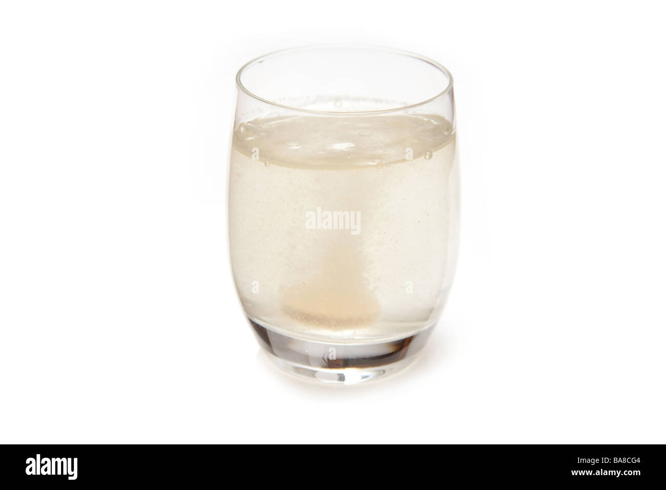 Effervescent vitamin C tablet in a glass of water Stock Photo