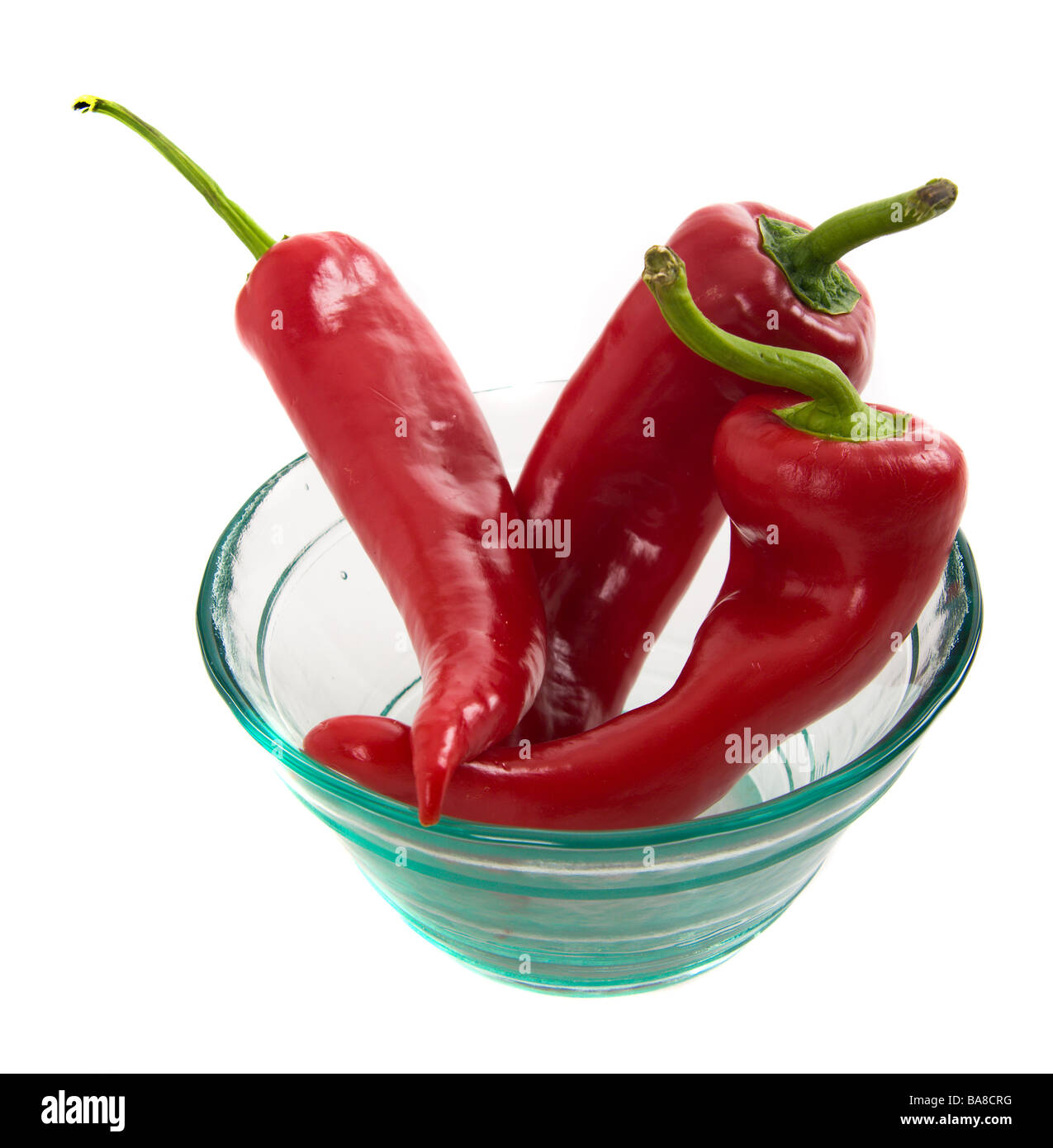 three peppers in a glass bowl Stock Photo Alamy