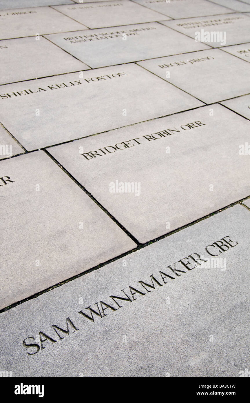 London, England, UK. Globe Theatre. Paving slabs in the courtyard displaying the names of donors - Sam Wanamaker CBE Stock Photo