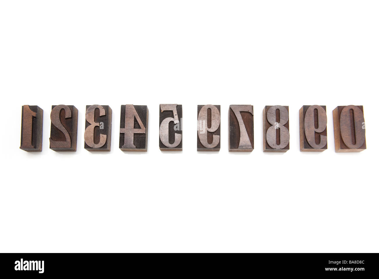 Wooden letterpress printing blocks isolated on a white studio background Stock Photo