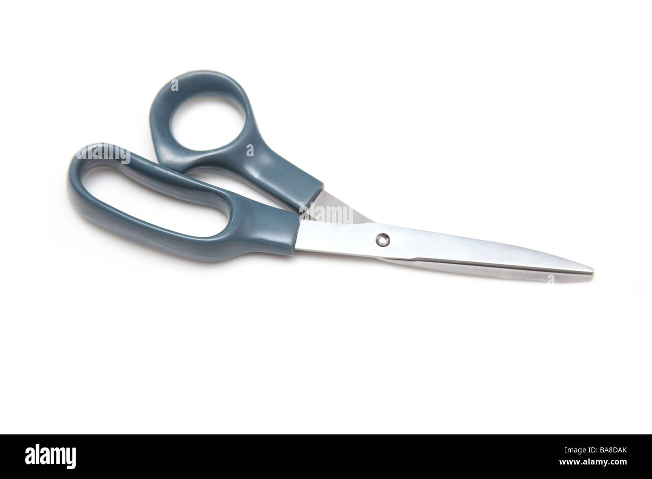 large scissors isolated on a white studio background Stock Photo