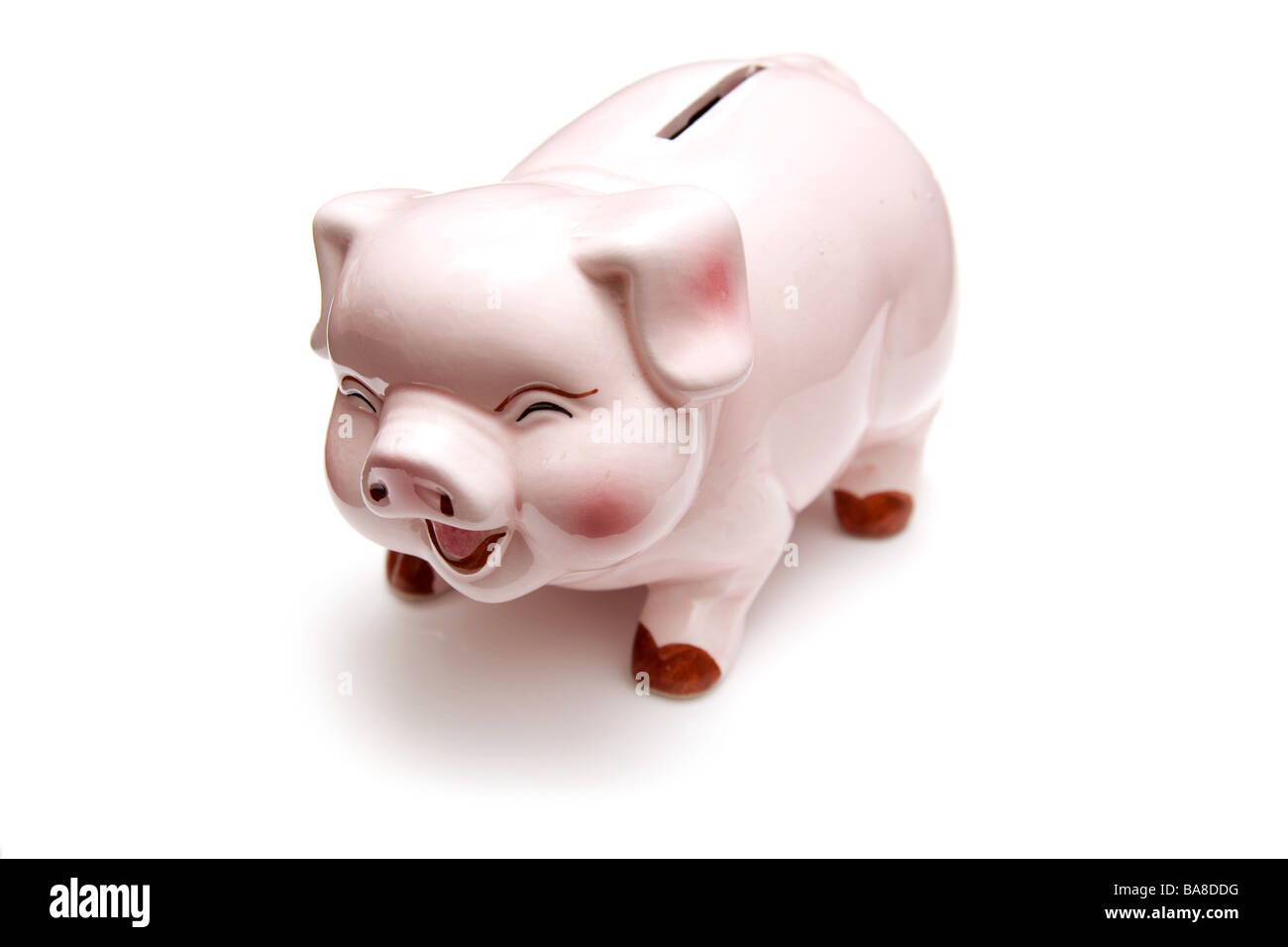 Piggy bank style money box isolated on a white studio background Stock ...