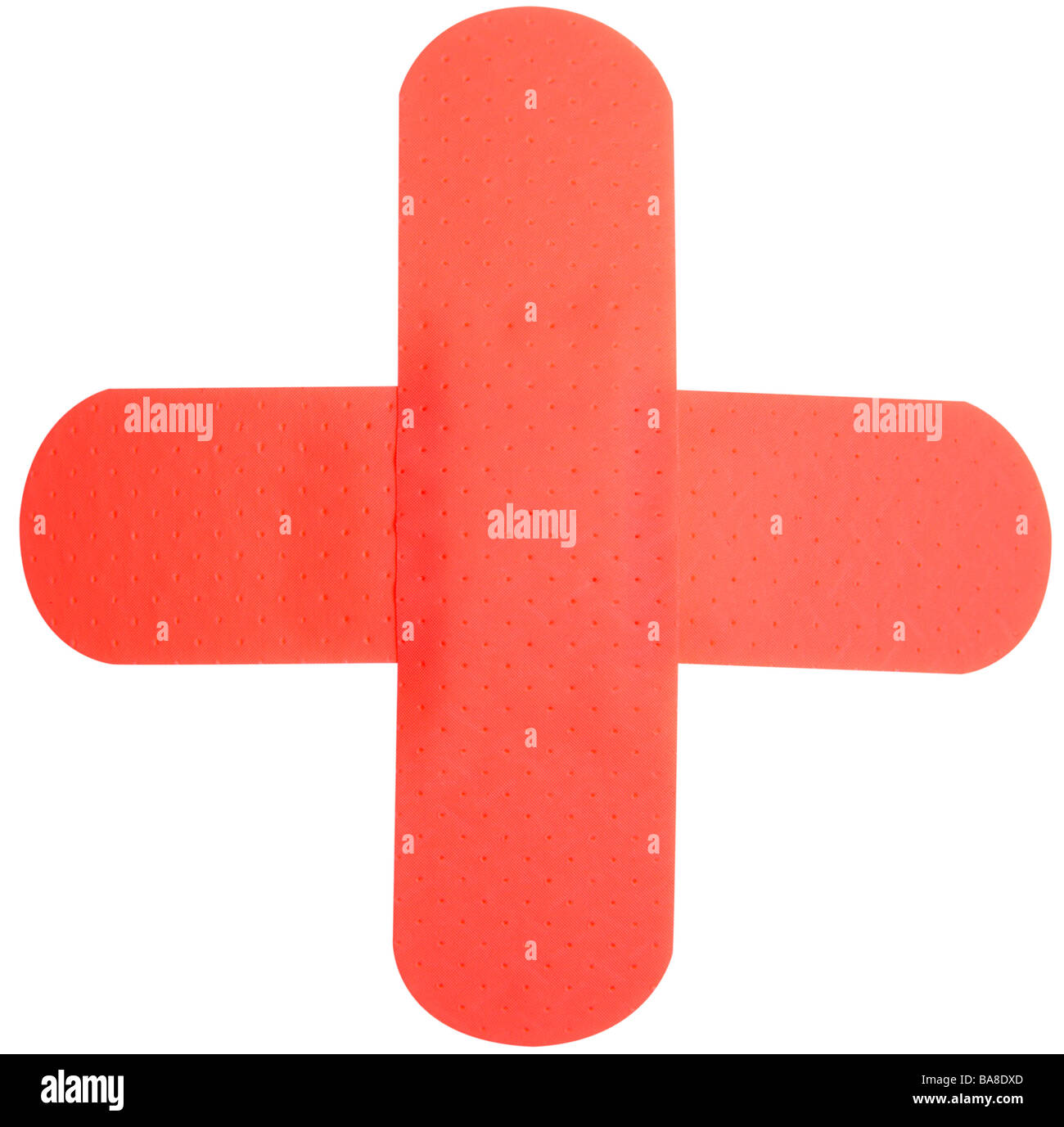 Red band aid plaster in shape RED CROSS Stock Photo