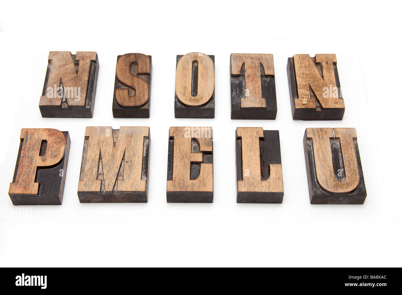 Wooden letterpress printing blocks isolated on a white studio background Stock Photo