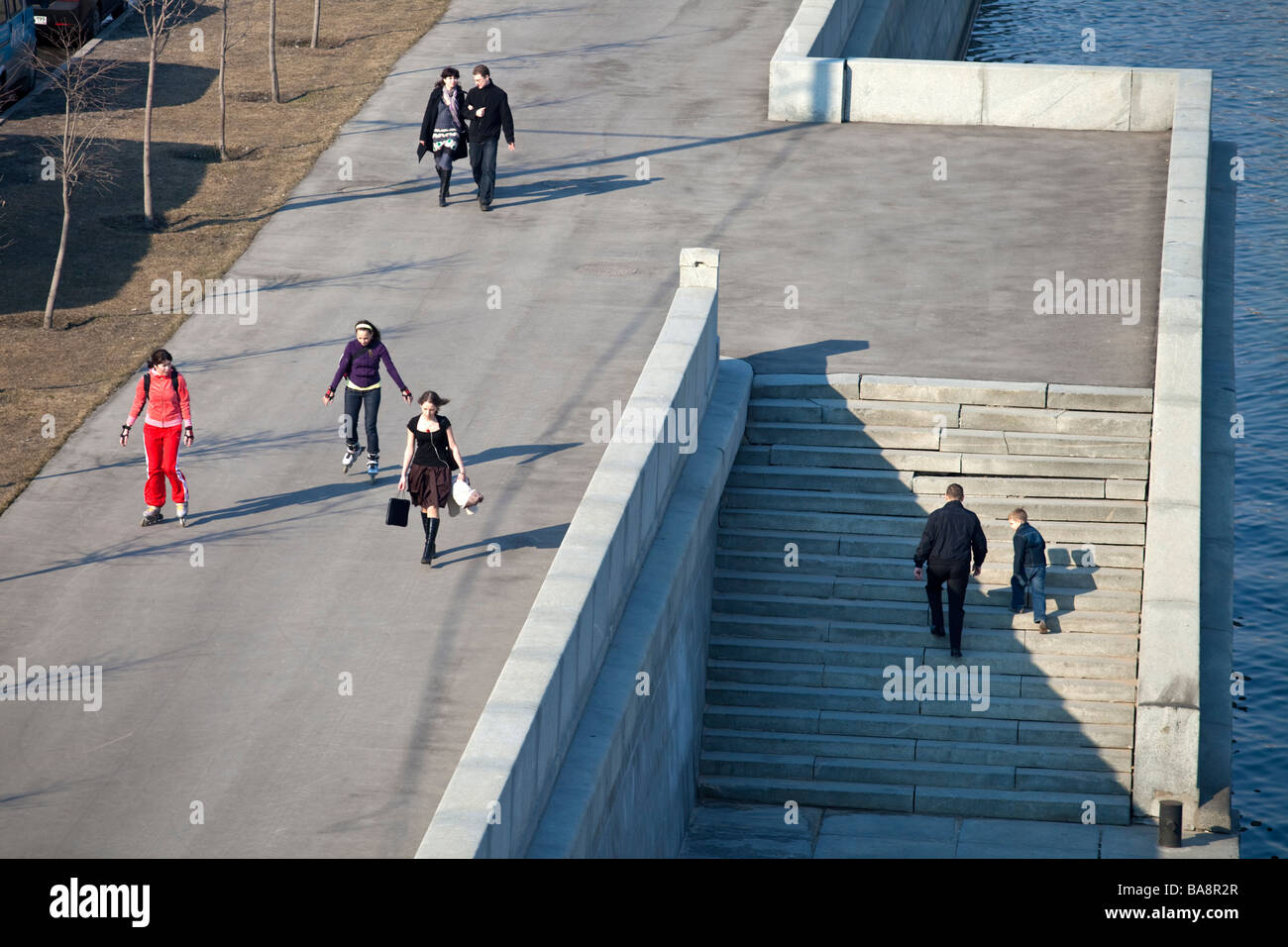 People walking on Moskva river shore, Moscow, Russia Stock Photo