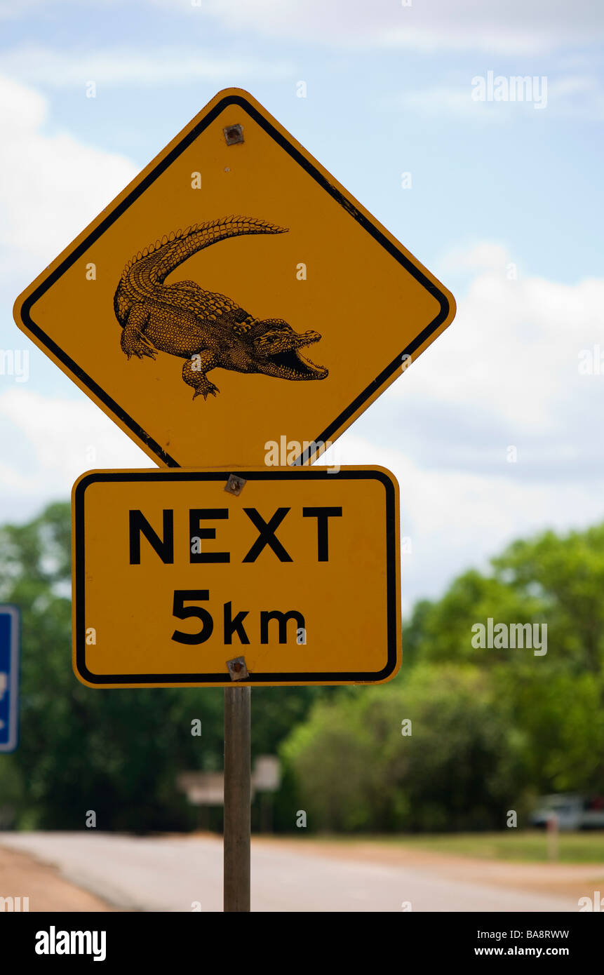 Crocodile hazard sign at the South Alligator River in Kakadu National Park, Northern Territory, AUSTRALIA Stock Photo