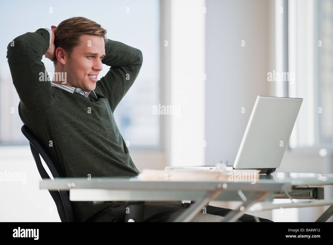 Confident businessman in office Stock Photo