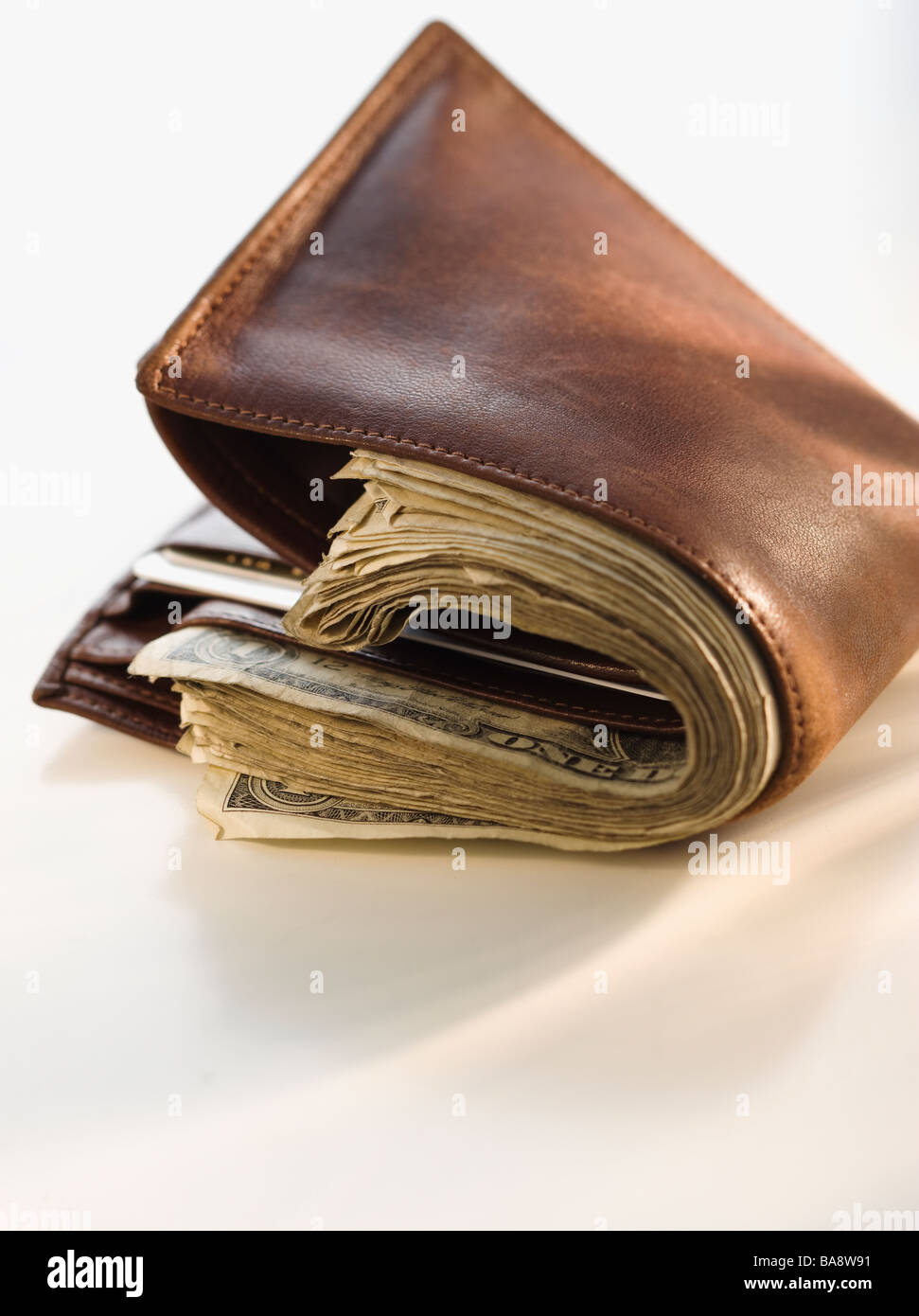 Overstuffed wallet Stock Photo