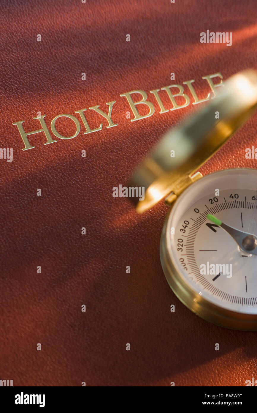 Compass and Holy Bible Stock Photo Alamy