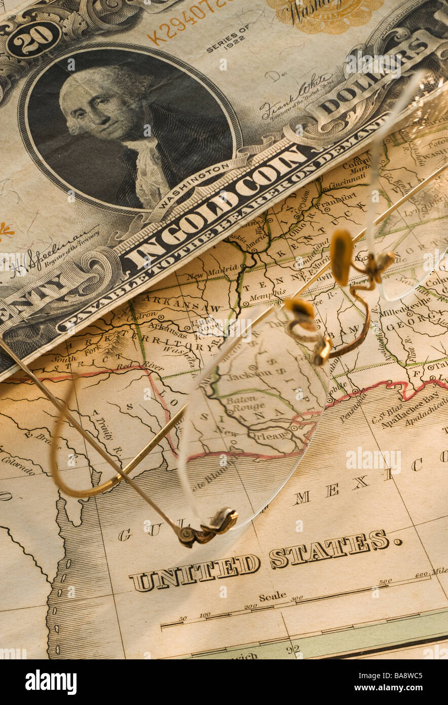 Antique map and dollar bill Stock Photo