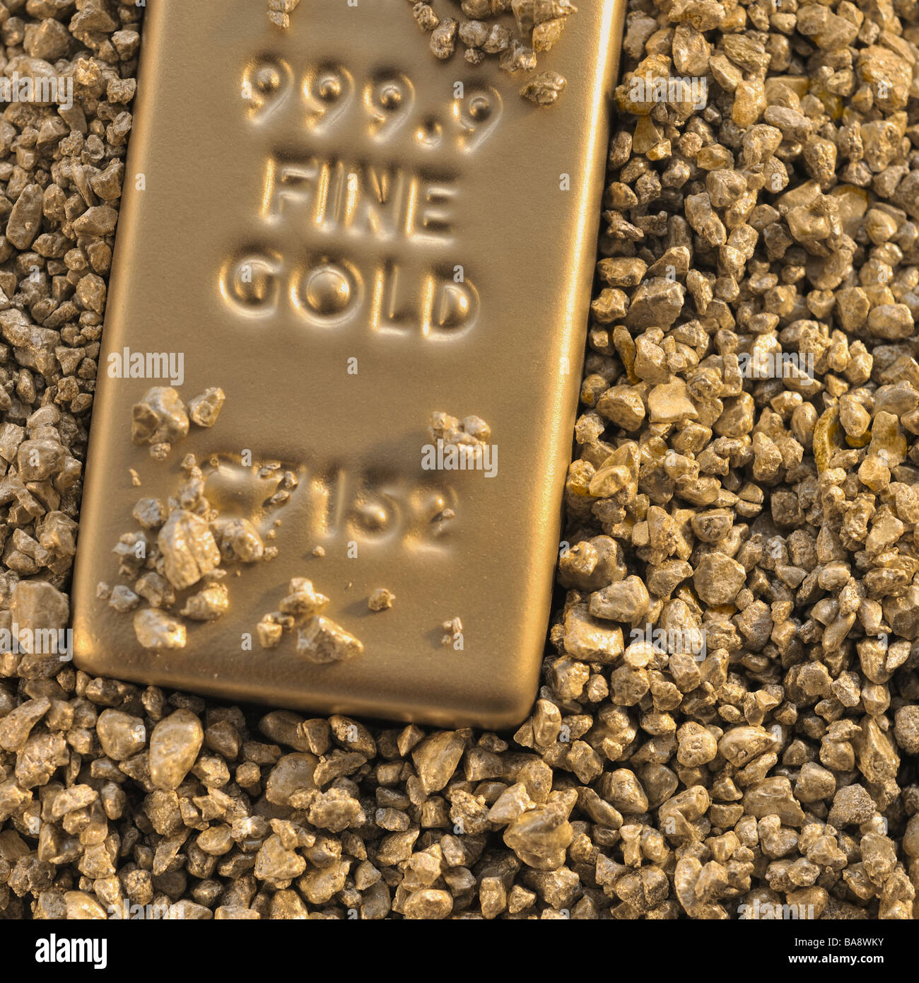 Gold block and nuggets Stock Photo