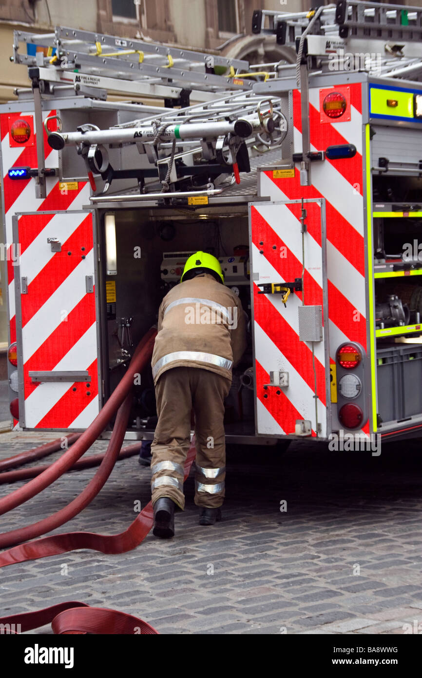 Scottish Fire and Rescue Service Fire engine attending to a shop fire along Castle Street in Dundee, UK Stock Photo