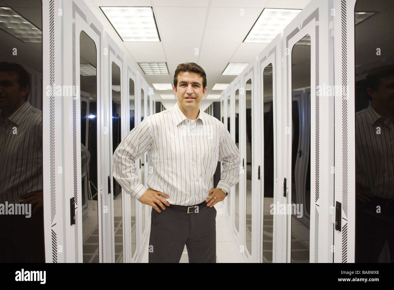 Computer entrepenuer in high tech environment. Direct  Portrait Stock Photo