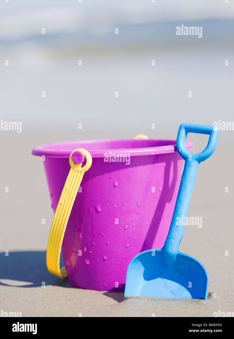 Bucket and shovel on beach Stock Photo Alamy