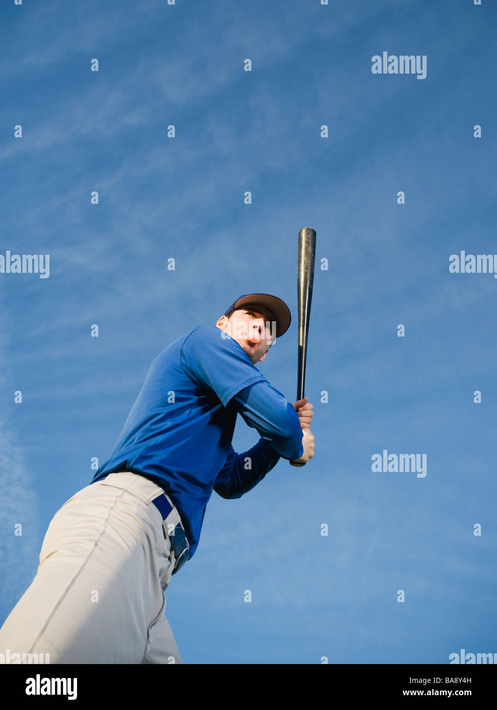 Baseball player swinging bat Stock Photo Alamy
