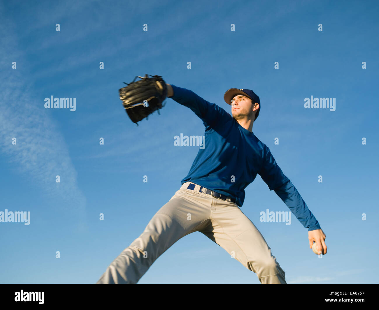Baseball player throwing ball Stock Photo Alamy