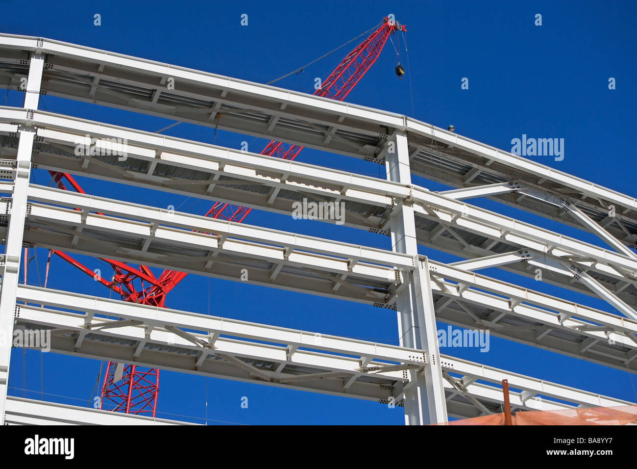 Construction beams and crane Stock Photo