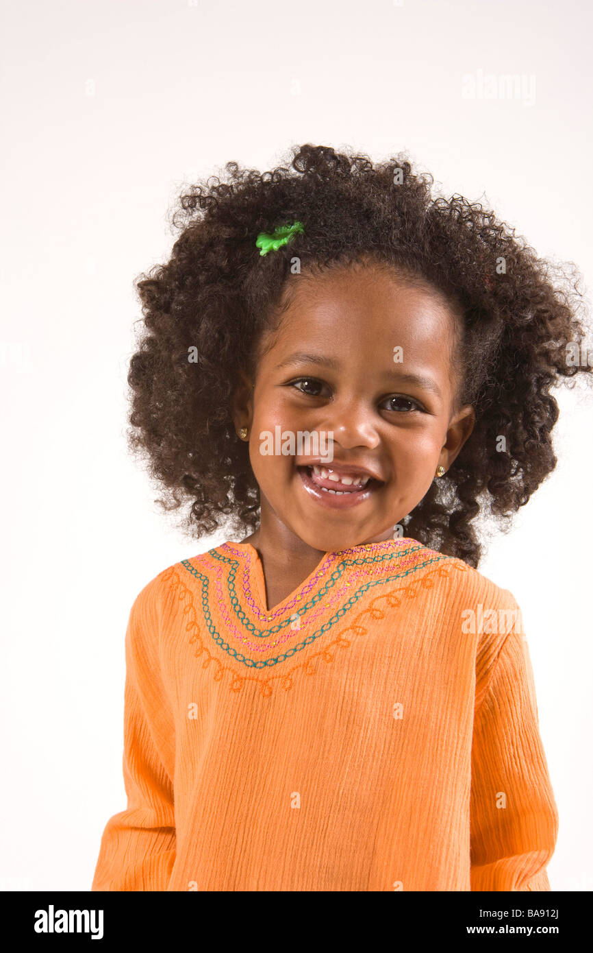 Portrait of cute African American girl, studio shot Stock Photo - Alamy