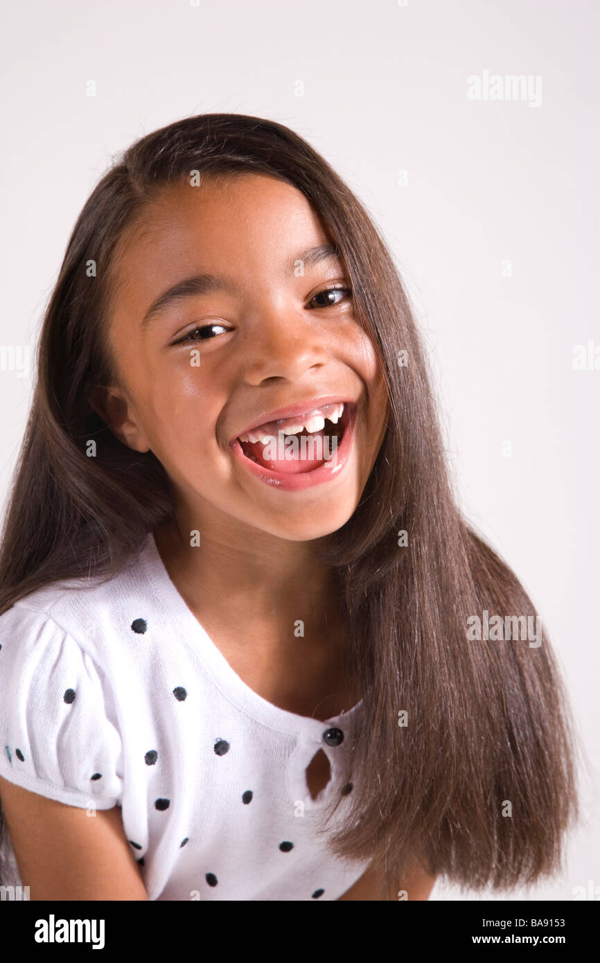 Portrait of cheerful African American girl, studio shot Stock Photo - Alamy