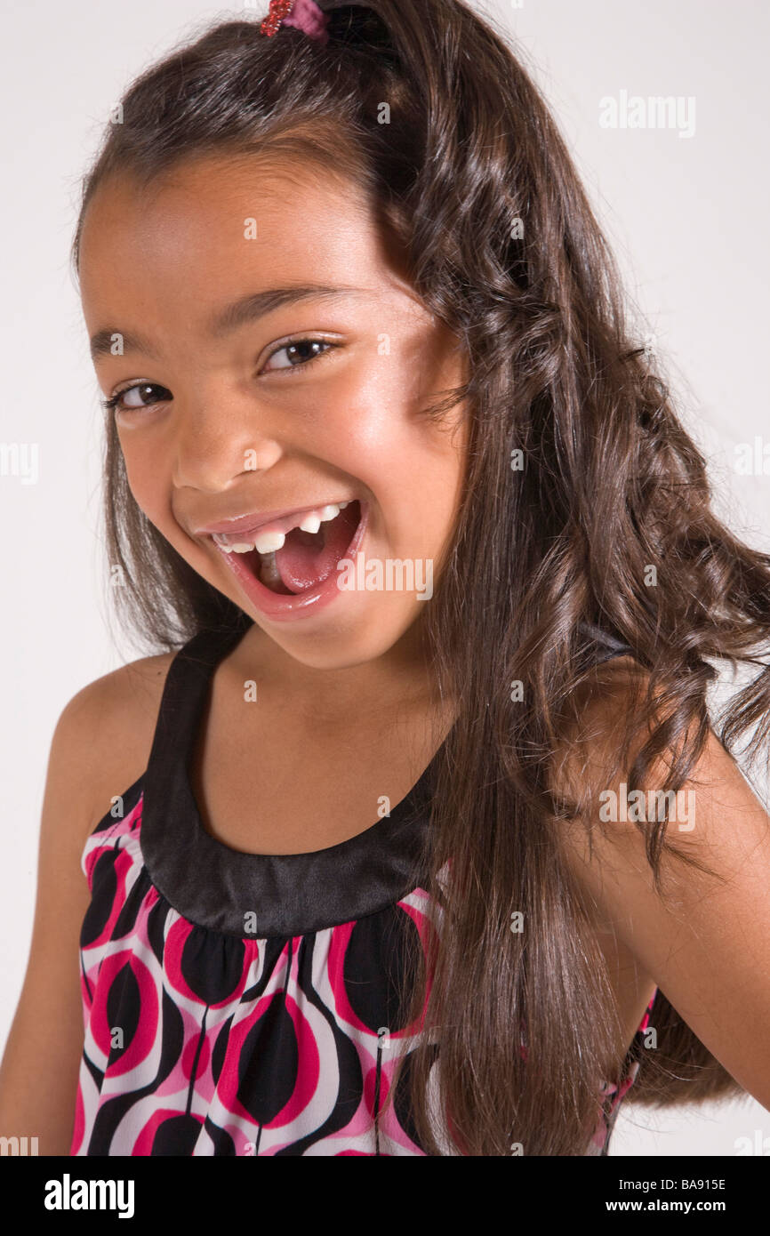 Portrait of cheerful African American girl, studio shot Stock Photo - Alamy
