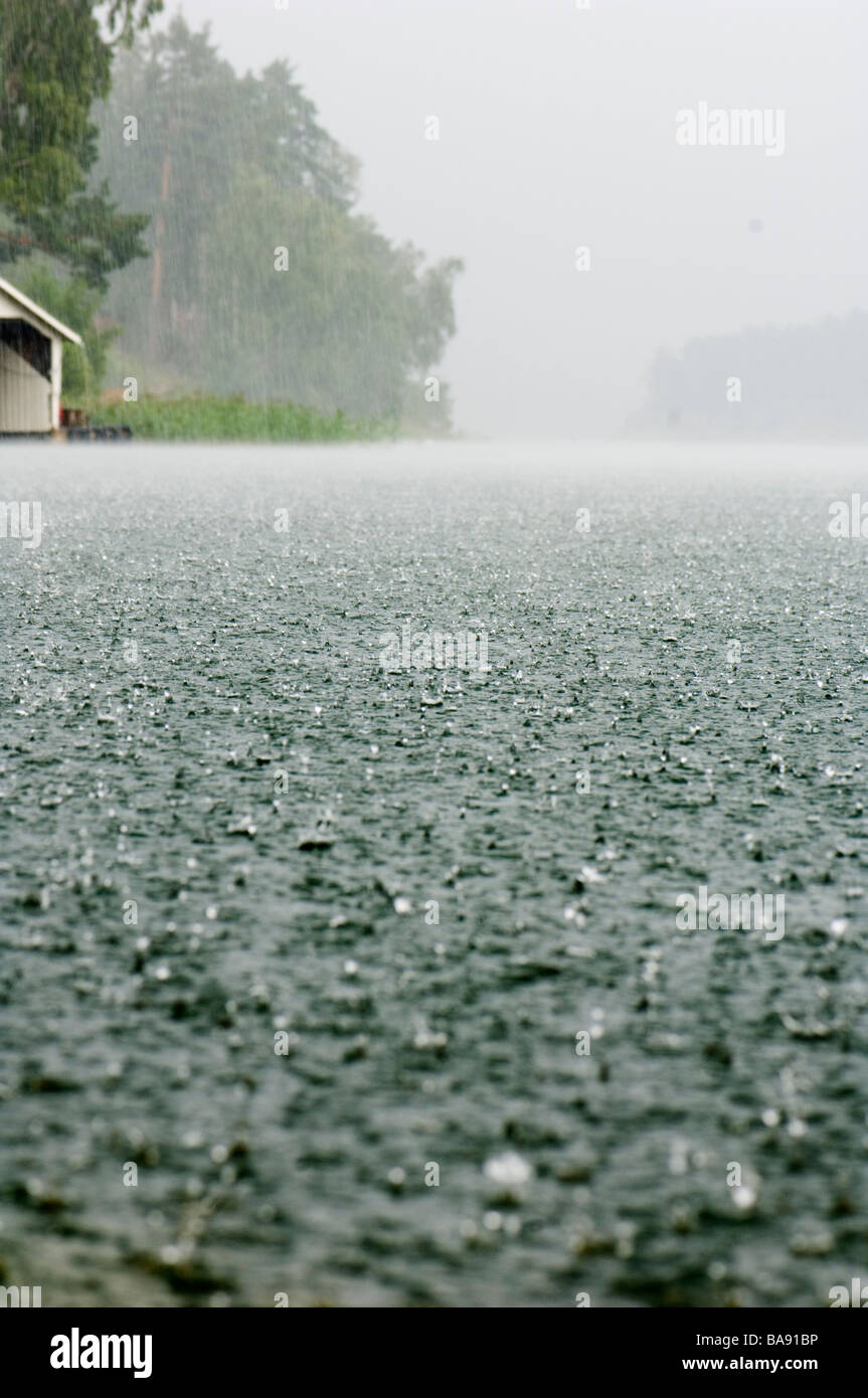 Rain on the water Sweden Stock Photo Alamy