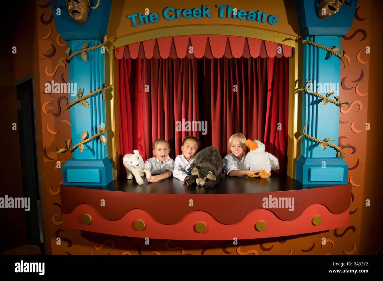 School kids doing puppet show in theatre at library Stock Photo - Alamy