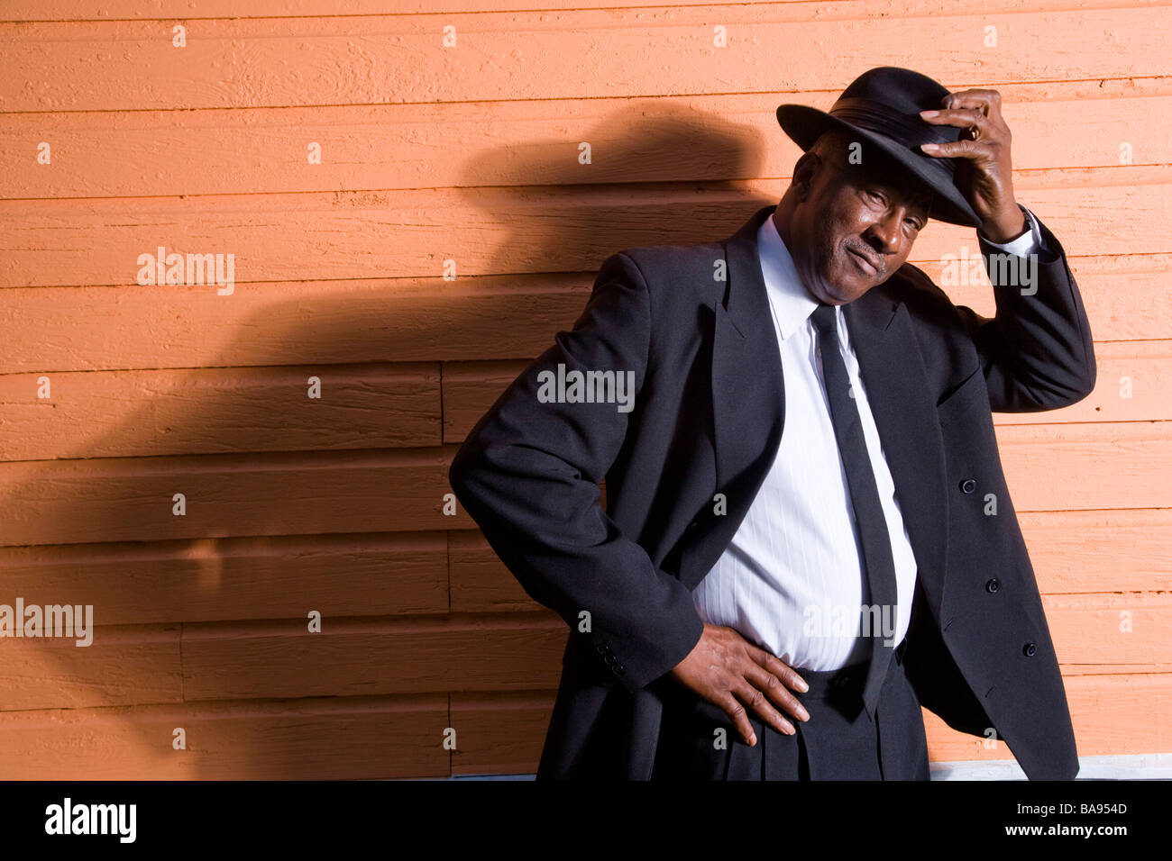Portrait of senior African American man in suit and fedora hat Stock ...