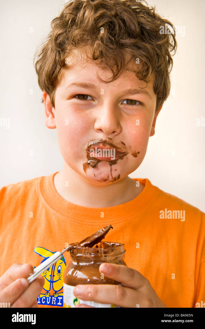 child who eats the chocolate Stock Photo Alamy