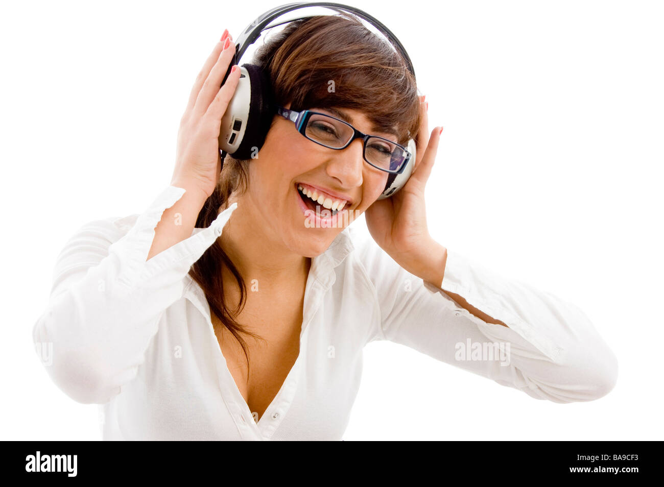 Female executive listening music hi-res stock photography and images ...