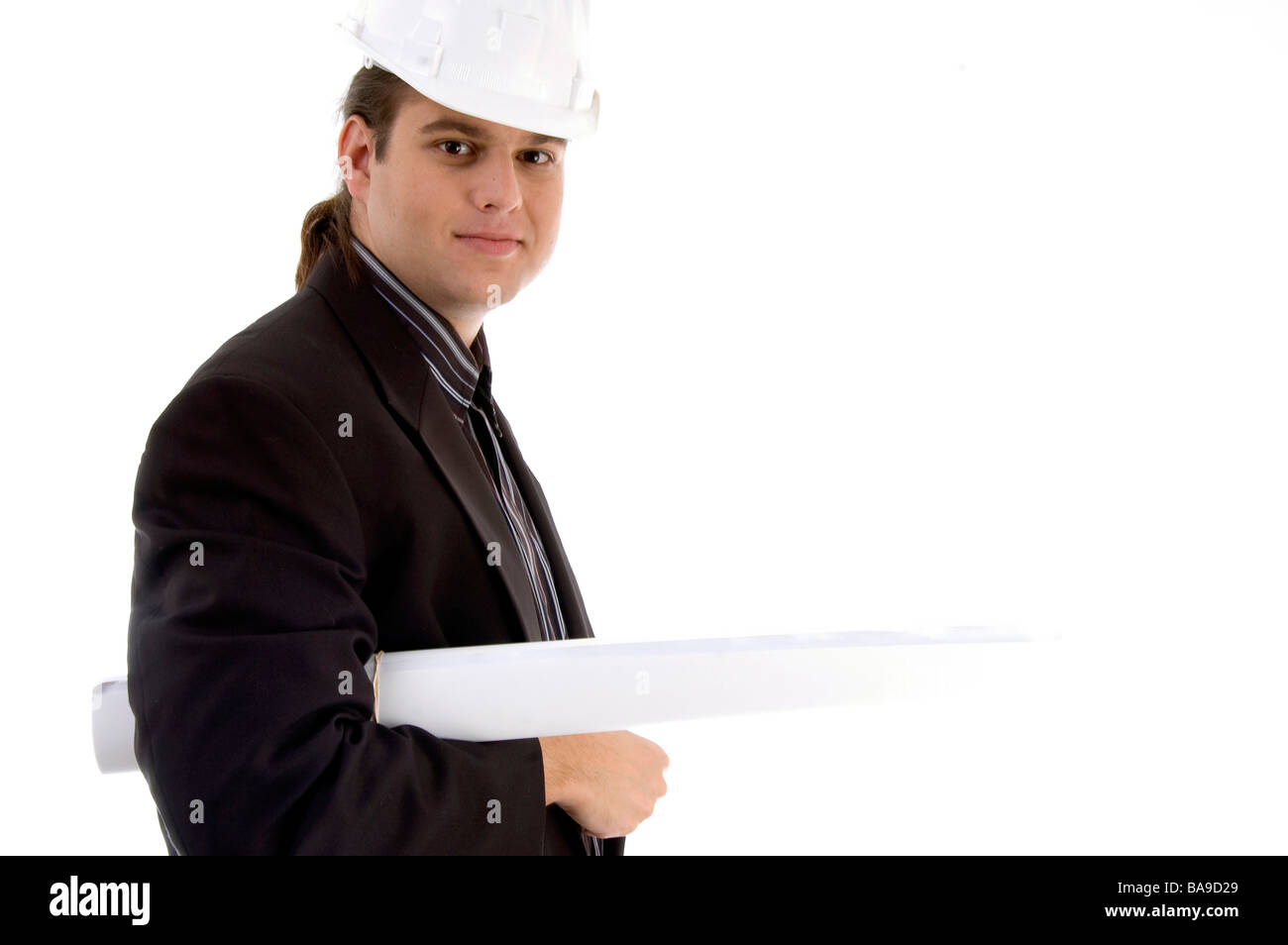 young architect holding blueprints Stock Photo Alamy