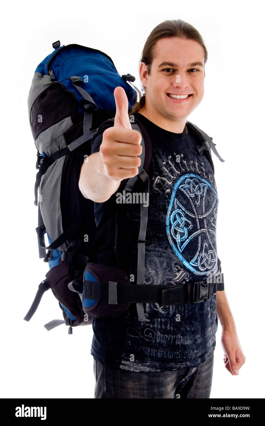 traveler with rucksack and thumbs up Stock Photo - Alamy